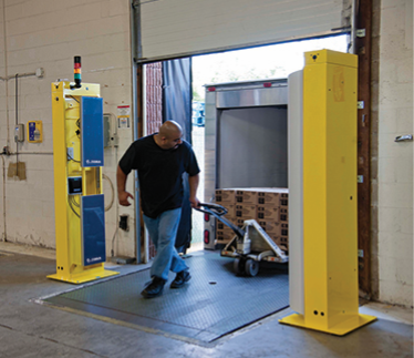 Fixed-reader RFID portal at a loading dock door with a signal light